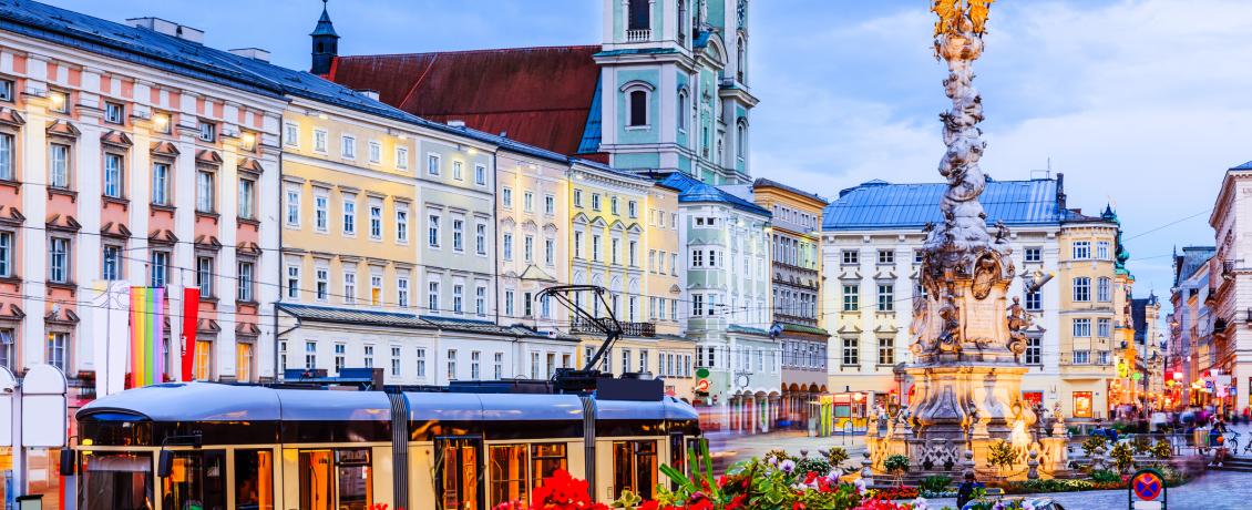 Explore squares graced with unique churches and music venues in Linz