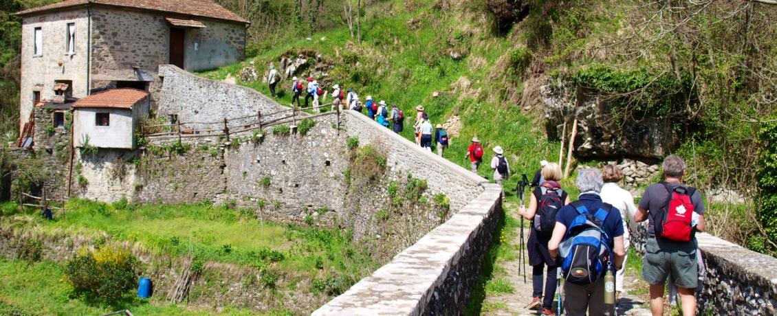 Crossing a 700 year old bridge in Tuscany, Italy